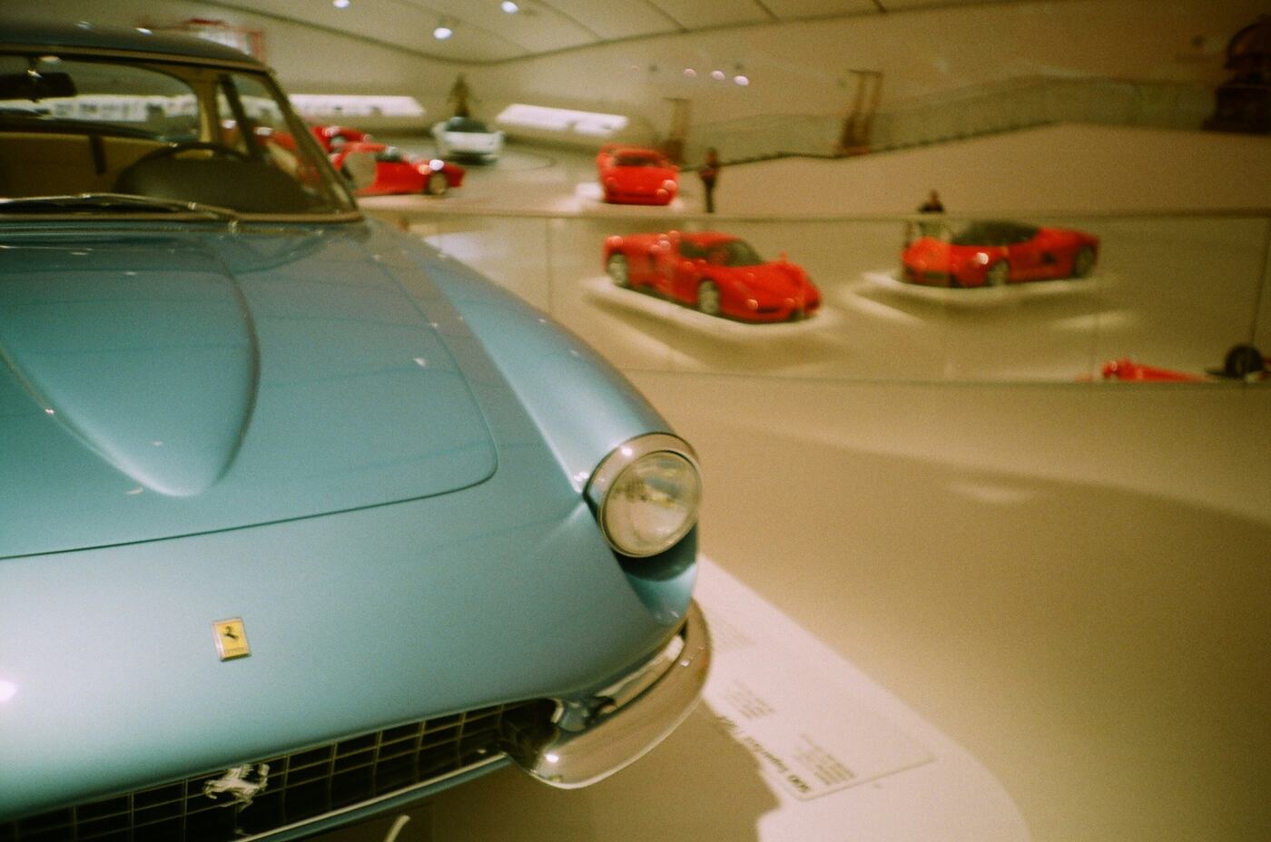 A classic Ferrari coupé inside the Maranello museum
