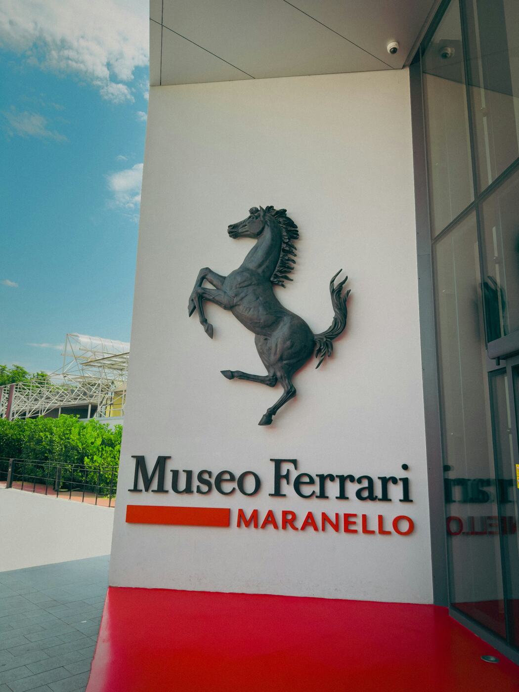 The entrance of the Museo Ferrari in Maranello, with the Prancing Horse