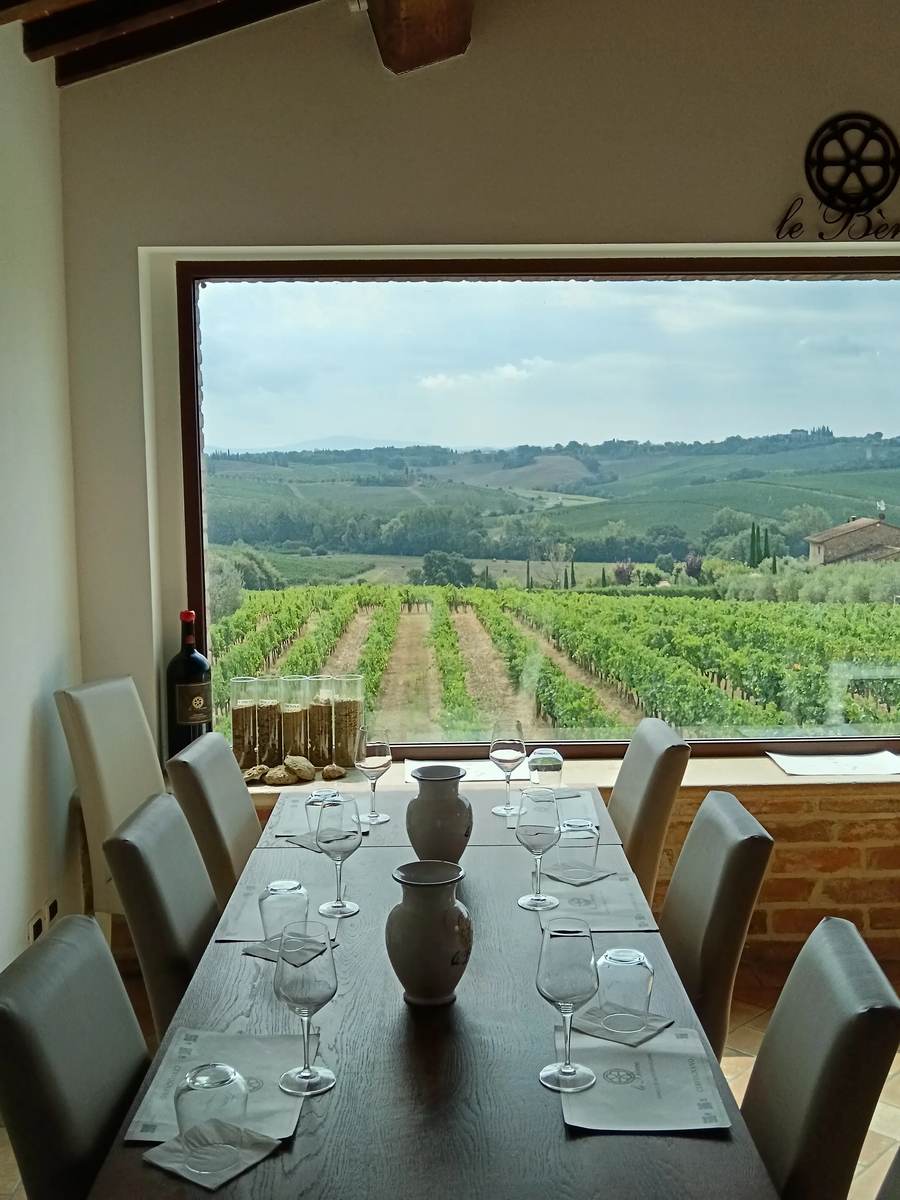 A tasting room window looking over the vineyards of Montepulciano