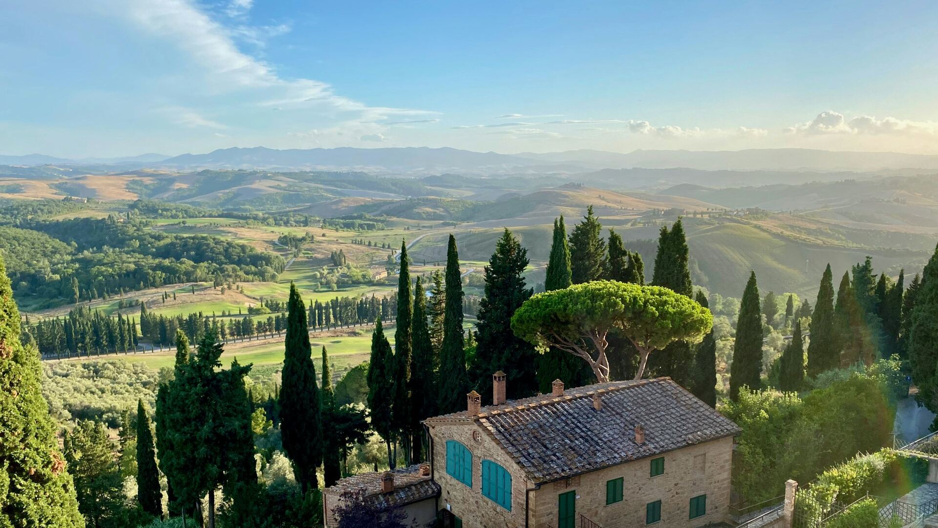 Cypresses and rolling hills in the countryside west of Florence