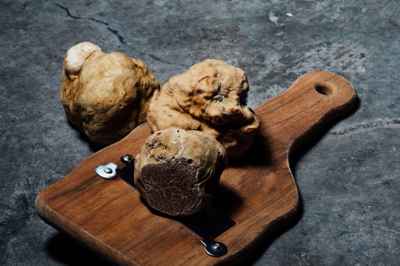 Fresh truffles on a wooden board