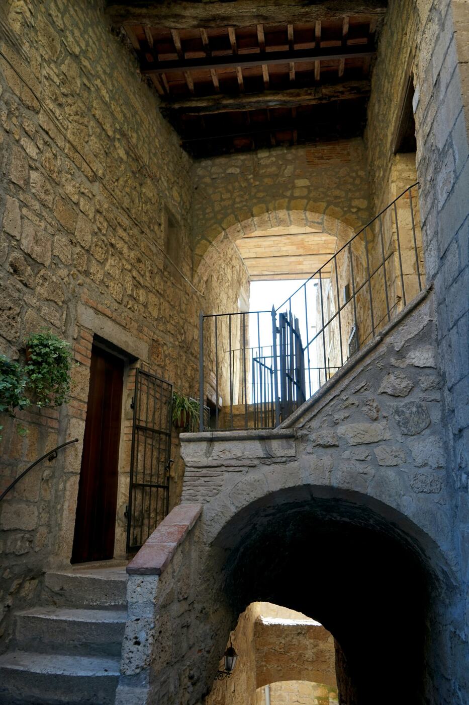 Stone stairs and arches in a tufa village of the Maremma